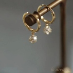 gold hoop pierce