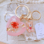 【ꫛꫀꪝ✧‧˚】くまちゃんの夢みるマトリカリアキーホルダー　ハンドメイドレジン　キーホルダー　ハンドメイドキーホルダー　シャカシャカキーホルダー　シャカシャカ　シェイカー　マトリカリア　ハーバリウム