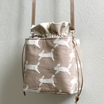 ⚮̈ミナペルホネン　runrunrun beige ネリオバッグ　あおり巾着バッグ