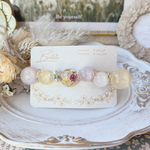 ✽.。ラプンツェルみたいなオーロラまん丸♡ハンドメイドレジンヘアクリップ