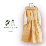 おとなかわいい花柄ティアードワンピース　オレンジ系　ぽわんと袖　コットン　ミディアム丈　長袖　ゆったりサイズ