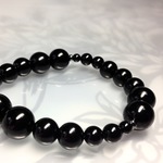 再5* ブラックオニキス 流れるデザインのブレスレット 天然石 パワーストーン