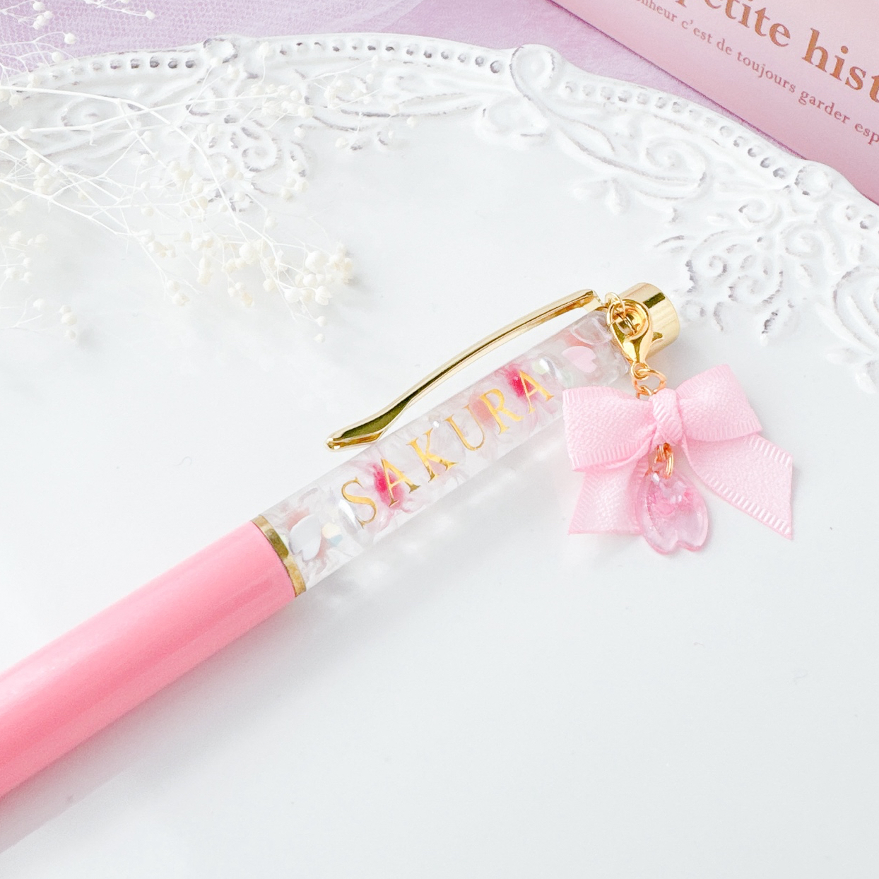 期間限定販売♡】リボンと桜のチャーム付き♡文字入れ可♡ 桜色のお花