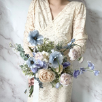 Dull blue fluffy clutch bouquet