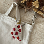 ミニポーチ　半月のかたち　ミニ持ち手付き