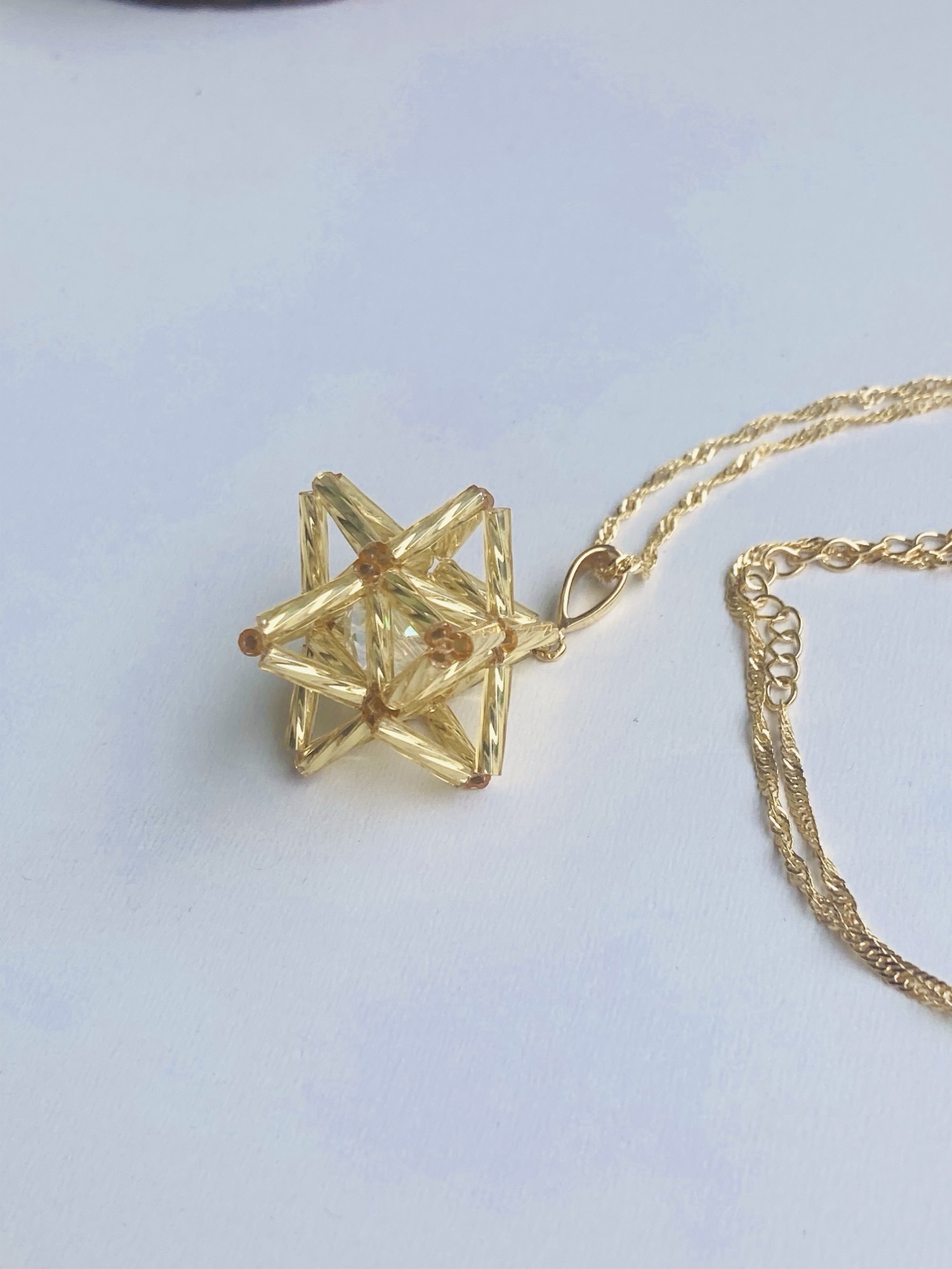 神聖幾何学 マカバピアス 揺れるビーズチャーム