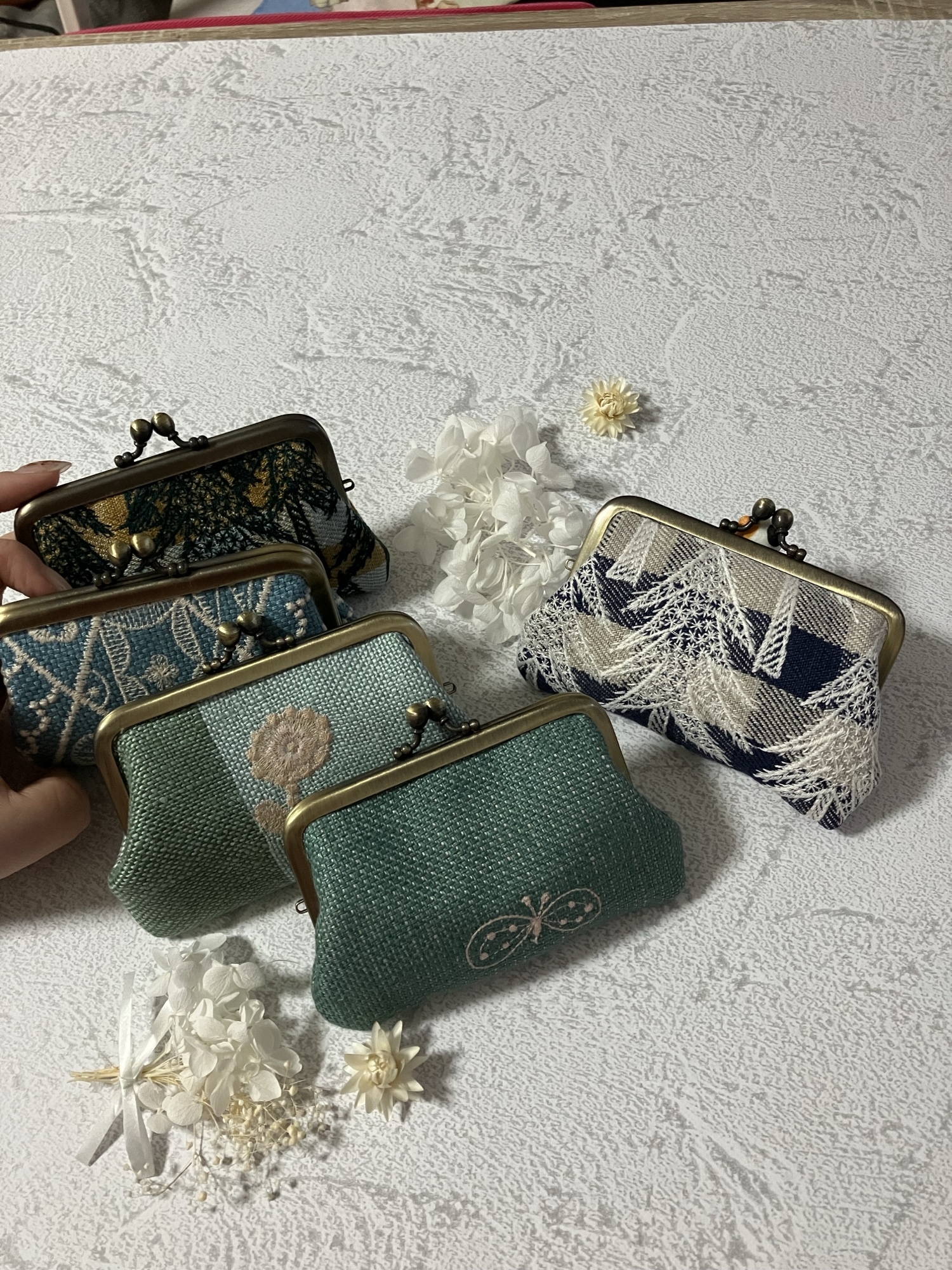 手馴染みがいい がま口 の mina perhonen ミナペルホネン symphony