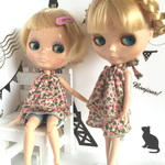 フォルターネックのチュニックとハーフパンツ