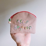 刺繍なミニミニポーチ（笑顔を忘れずに）