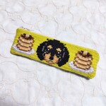 ツヴィスト刺繍のダックスちゃんのポーチ