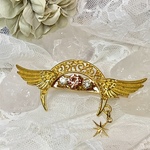 月と羽根と揺れる星のクリップ