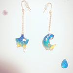 溶け浮かぶ月と星