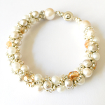 銀色唐草ビーズと差し色ブラウンのブレスレット