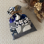 表情豊かなパッチワークきんちゃく