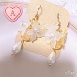 23☆フラワーとオレンジピアス🍊