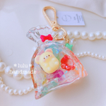 ねずみちゃんのCandy巾着キーホルダー　ハンドメイドレジン　キーホルダー　ハンドメイドキーホルダー　シャカシャカキーホルダー　シャカシャカ　シェイカー　くま　キャンディ　ドロップ　キャンディバッグ