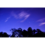 夜空と雲と星々の写真