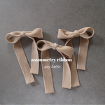 large asymmetry  ribbon soy latte
