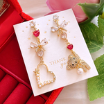 お洒落 大人可愛い ジルコニアリボン asymmetry ハンドメイドピアス イヤリング レディース アクセサリー