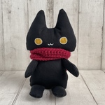 まんまる目のおすわり黒猫