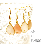 design charm × snow charm earrings 