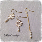 ピアス ✳︎透かし花チャームとケシパール