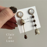 No.67❤︎long brown pearl tulip pierce
