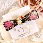🎀お花とビジューのリボン型ヘアクリップ(ピンク×黒)