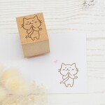 もじもじしながら自分のしっぽをかかえちゃう猫のはんこ
