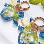キラキラ✨青りんご🍏♬.*ﾟシェイカーキーホルダー  レジンキーホルダー
