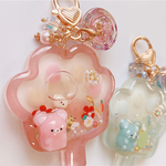 淡ピンク　肉きゅうシェイカー　オイルキーホルダー  ハンドメイド　レジン　シャカシャカキーホルダー　シェイカー　ハムちゃん　くまちゃんフラワーバス