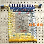 タッタヒトツ巾着　パッチワークBLUE＆YELLOW　そしてワンコ刺しゅう