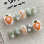 人参に埋まった　くまネイル　白くま　クマ　韓国　にんじん　野菜　オレンジ　ホワイト　白　ミルクグリーン　ニュアンス　緑　花　フラワー　パール