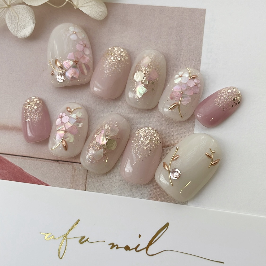Sparkling pink shell flower nail