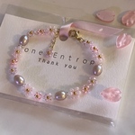 つやつやピンク淡水パールとパールピンクのお花のビーズブレスレット / Pink Freshwater pearls & beaded flowers bracelet