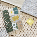 《受注製作》☑︎サイズ選択可　ほぼ日手帳カバー ミナペルホネン tambourine green ◯beigeに forest wingのpieceをメインに片面チョコっとパッチカバー