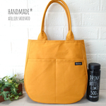 【在庫sale】帆布  ラウンドトートバッグ ＊2ポケット＊肩掛け＊A4収納＊マスタード＊