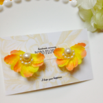 オレンジのお花とコットンパールのイヤリング