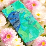 青葉の中の青い鳥の手帳型iPhoneケース