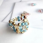 ディープブルーアクアマリンの花編みワイドリング