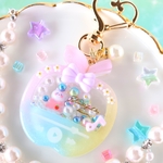 たまごっちのようなりんご型　音楽プレイヤー　ゆめかわ　シェイカーキーホルダー　シャカシャカキーホルダー　シェイカー　シャカシャカ　バッグチャーム