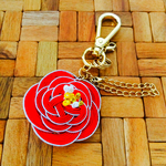 朱の一輪の花が咲く バックチャーム