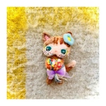 お花が大好きな仔猫ちゃんから花束の贈り物です♪羊毛フェルトブローチ