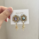 H193.キラッキラ✨️輝く ビーズ刺繍ピアス イヤリング 天然シェル シェルボタン エメラルドグリーン オーロラ 華やか 特別 星 スター ゴールド gold 個性的 大人可愛い お呼ばれ