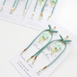 揺れるリボンの耳飾り(グリーン)