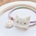 レジン　ヘアゴム　ワンコイン♡ 白猫のキラキラレジンヘアゴム　肉球チャーム付き🐾　猫レスキュー88