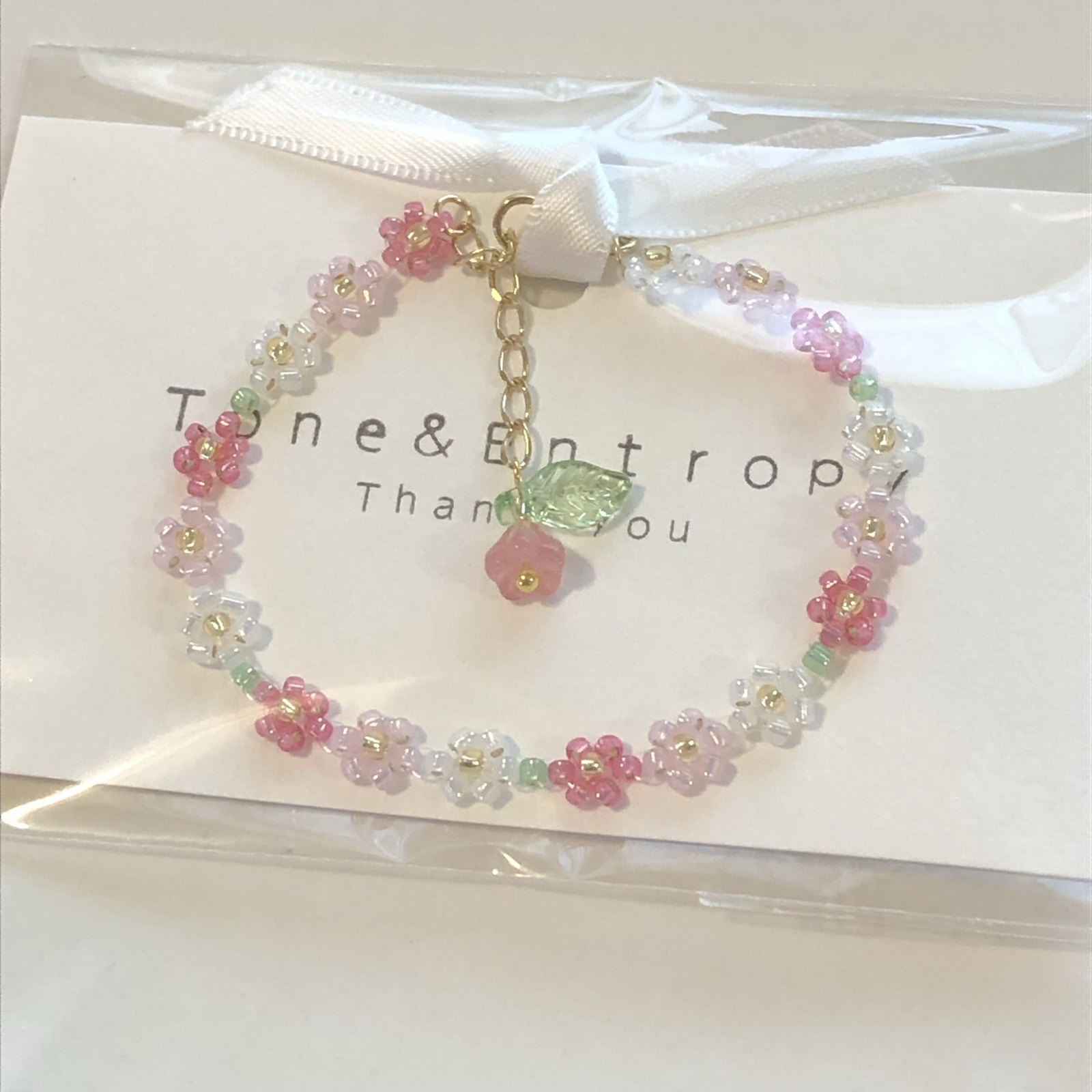 オーロラピンクグラデーションのお花のビーズブレスレット - Tone