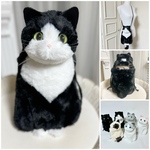 ぬいぐるみみたいな 白黒ハチワレ猫さんのお座りスマホポシェット　ミニショルダー　スマホショルダー　ねこ　猫雑貨　猫グッズ　リアル　ショルダーバッグ　巾着　ペットボトルケース　水筒ケース　