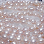 《パーツ》淡水パール/ライトモウブ/5.5mmライス40cm一連
