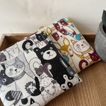 バネ口ラミネートポーチ　動物いっぱい　ブラウン